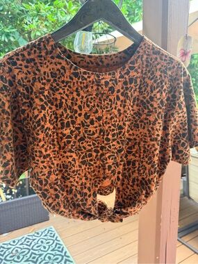 Necessary Objects Orange and Black Leopard Tie-Front Crop Top